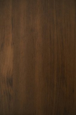 Zengin, koyu kahverengi ahşap dokusu belirgin dikey tahıllar sergiliyor, arka plan ya da örtüler için mükemmel..