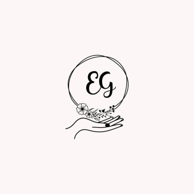 Minimalist El Çizimi EG Çiçek ve El Elementleri ile İlk Logo