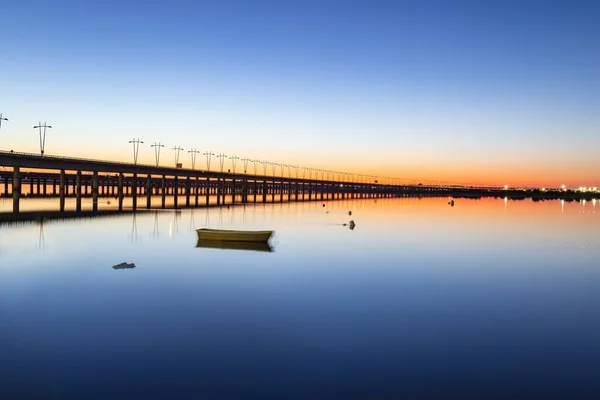 Long time exposure photograph of the Puente del Odiel or Puente-Sifon Santa Eulalia at sunset in Huelva, Andalusia, Spain