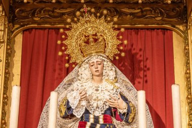 Image of Our Lady La Virgen de la Estrella Coronada (Virgin of Star) inside of the Chapel of the Brotherhood of the Estrella de Triana, in Seville, Andalusia, Spain