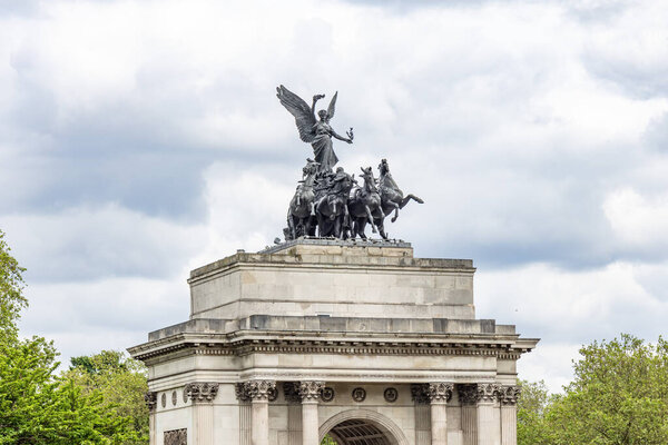 The Wellington Arch, also known as the Constitution Arch or, originally,  as the Green Park Arch, is a triumphal arch by Decimus Burton that forms a centrepiece of Hyde Park Corner in central London