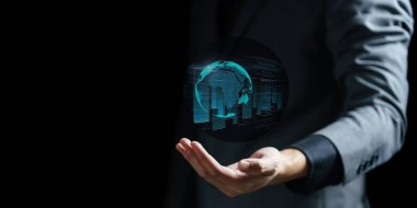 Sanal simgeyi tutan iş adamı eli.