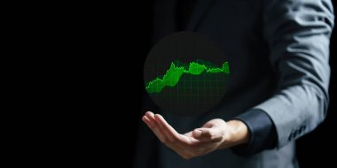 Sanal grafik gösteren işadamı eli