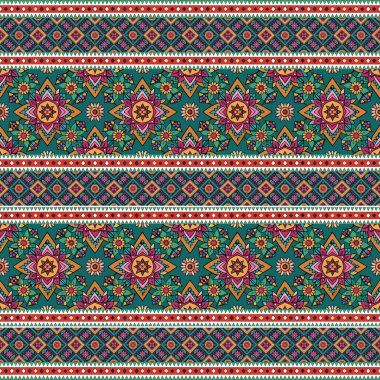 Kumaşın üzerine geleneksel nakış süsü.