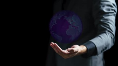 İş adamı eli dünya küresi ve iş konseptini gösteriyor.