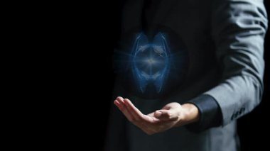 Işıldayan dünyayı elinde tutan iş adamı. Karışık medya. karışık