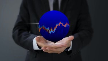 İş adamı elinde grafikle tablet tutuyor.