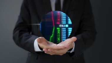 İş adamı elinde 3 boyutlu bir çizim tutuyor.