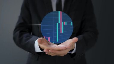 Bir çizelge tutan işadamının eli