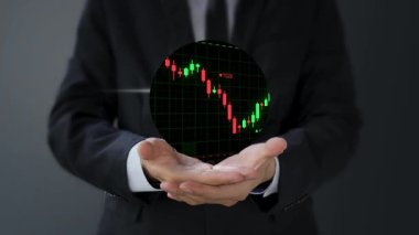 Hisse senedi ticareti grafiği olan iş adamı