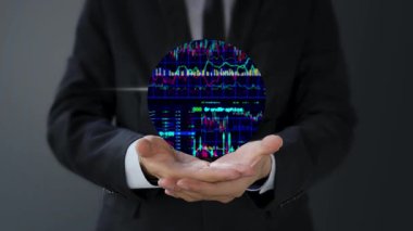 İşadamı grafikle el ele, ekranda borsa grafiği, dijital teknoloji ve dijital pazarlama kavramı.