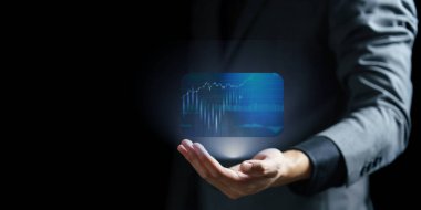 Finansal verilerin sanal bir simgesini tutan