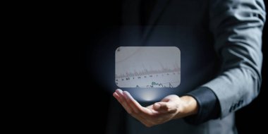 Sanal iş grafiğinde, diyagramda, grafikte, diyagramda sanal bir simge tutuyor..