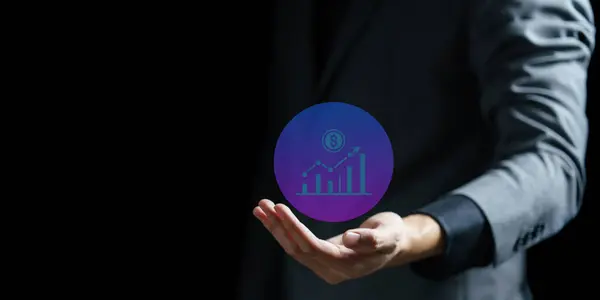 İş adamı elinde iş ve finans sembolü, iş konsepti