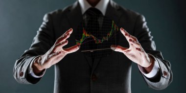 İş adamlarının el ele verdiği mali ticaret grafiği