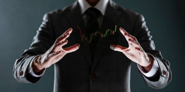 El altından finansal semboller geliyor.