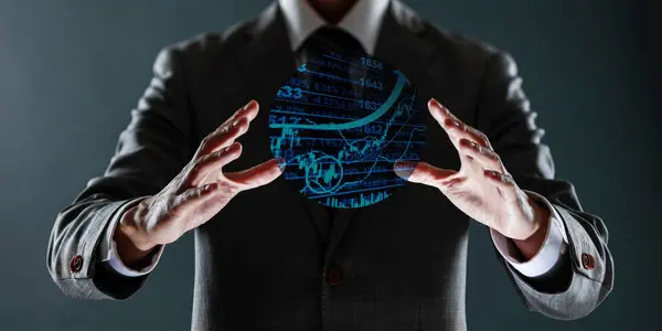 Elden gelen finansal sembollere sahip iş adamı, borsa konsepti.