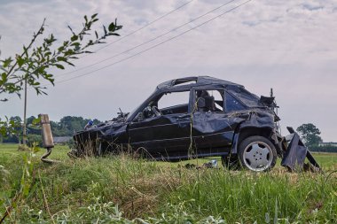 August 19, 2022 Mengele, Latvia: car after accident on a road because of frontal collision, transportation background