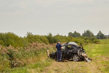 August 19, 2022 Mengele, Latvia: car after accident on a road because of frontal collision, transportation background