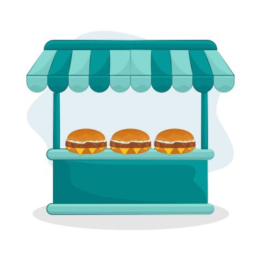 Bu hamburger tezgahı temiz ve düzenli görünüyor. Yemekler düzenli ve yüzeyler temiz. Müşterileri davet edebilen bir atmosfer yaratıyor..