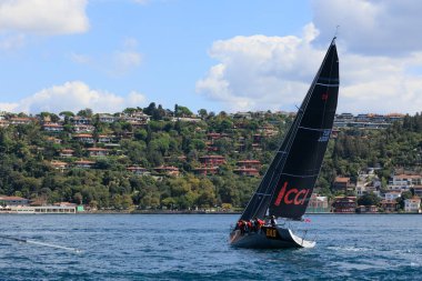 COCA COLA ECEK / DAS  team's sailboat front passing through the Bosphorus in 24th Bosphorus Cup on 20 September 2025