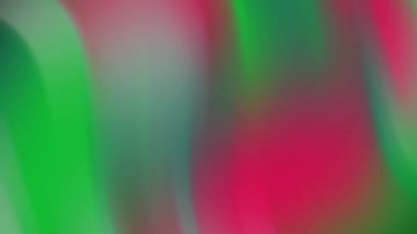 Canlı ve akışkan soyut gradyan arkaplan, görsel temas için hafif kıvrımlı kıvrımlı hareketli bulanık yeşil ve kırmızı renklerin büyüleyici bir karışımını içeriyor..