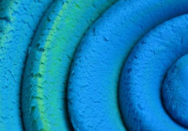Oyun hamuru modelleme kil spiral içine yuvarlandı üst ayrıntılı görünüm dokusu arkaplan yeni olo rengi. Sahte yeni olo rengi örneği. Bağlayıcı resim.