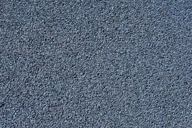 Mavi spor lastik kaplama kaplama yakın. Oyun alanı kaldırım arkaplan dokusu.