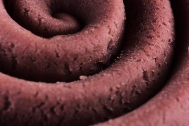 Hamur modelleme kil sarmal içine yuvarlandı üst ayrıntılı görünüm dokusu arka plan pembe