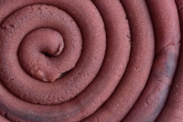 Hamur modelleme kil sarmal içine yuvarlandı üst ayrıntılı görünüm dokusu arka plan pembe