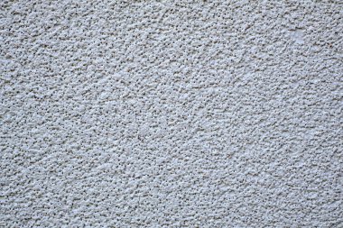 Bir duvarın beyaz taneli dokusu