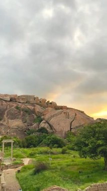 A sweeping panoramic view from inside the historic Chitradurga Fort in Karnataka, India, capturing the ancient stone architecture, crumbling ramparts, and rugged terrain of this legendary fortress. It stands as India rich architectural and heritage.