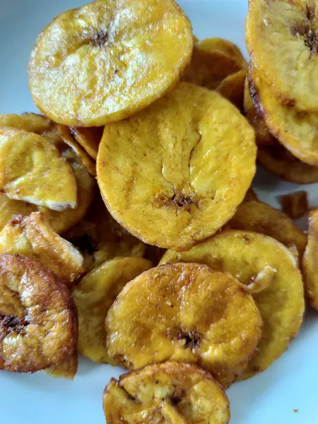 Lezzetli altın ve çıtır çıtır muz cipsi. Popüler ve sağlıklı bir atıştırmalık. Gıda blogları için ideal, sağlıklı beslenme içeriği, ya da Malang 'da bulunanlar gibi Endonezya' dan gelen doğal yiyecekler..