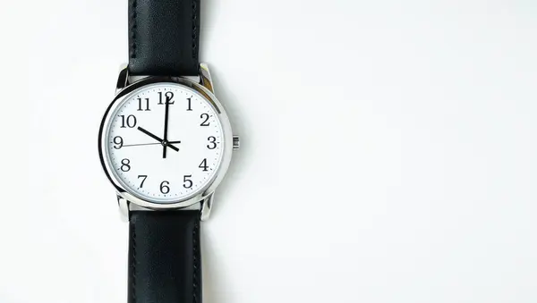 stock image A close up of a wristwatch with a black leather strap, copy space. High quality photo