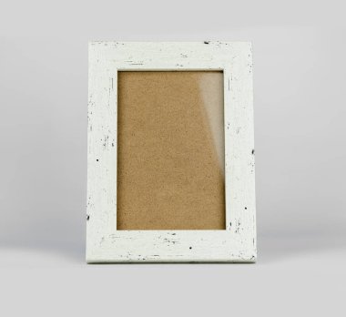 mockup of a photo frame ready for displaying artwork or pictures, set against a smooth gray background clipart