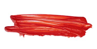 Kalın bir kırmızı boya, beyaz bir yüzeye yayılır.