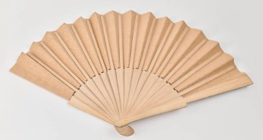 Doğal malzemelerden yapılmış dekoratif el vantilatörü. Yüksek kalite fotoğraf