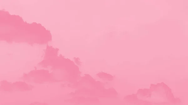 Pink clouds on light pink sky background, pastel sky panorama