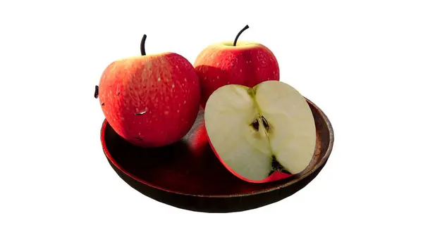 Tahta bir tabakta kırmızı elmalar