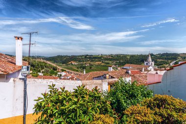 Portekiz 'in Obidos kenti 11 Mayıs 2022' de, Portekiz 'in Bidos-A Estremadura eyaletine bağlı Pedro e Sobral da Lagoa bölgesinde bulunan ve iyi korunmuş bir ortaçağ şatosudur..