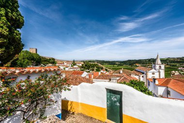 Portekiz 'in Obidos kenti 11 Mayıs 2022' de, Portekiz 'in Bidos-A Estremadura eyaletine bağlı Pedro e Sobral da Lagoa bölgesinde bulunan ve iyi korunmuş bir ortaçağ şatosudur..