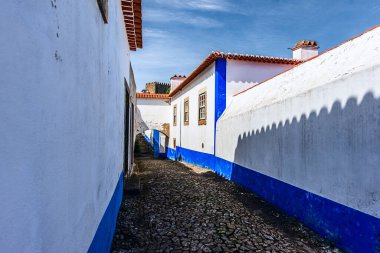 Portekiz 'in Obidos kenti 11 Mayıs 2022' de, Portekiz 'in Bidos-A Estremadura eyaletine bağlı Pedro e Sobral da Lagoa bölgesinde bulunan ve iyi korunmuş bir ortaçağ şatosudur..