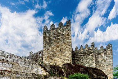 Guimaraes, Portugal May 16, 2022: Castle of Guimares in north Portugal, was built under the orders of Mumadona Dias in the 10th century to defend the monastery from attacks by Moors and Norsemen.