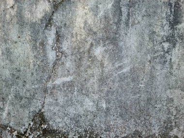 Çatlak ve soyulmuş beton duvar dokusu.
