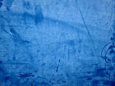 Yıpranmış desenli soluk mavi duvar.