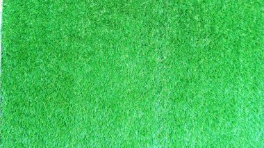 Yakın plan ile sentetik çimlerin soyut arkaplanı.