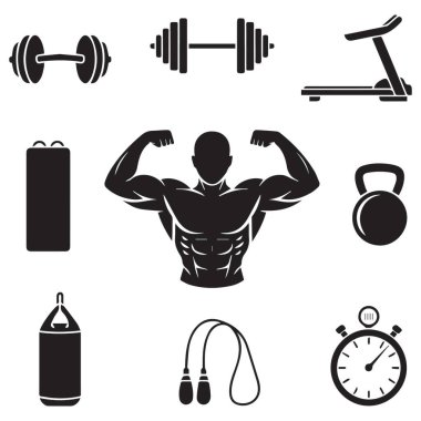 Bu görüntü, sağlıklı ve aktif bir yaşam tarzına ulaşmak için gerekli araç ve kaynakları temsil eden çeşitli spor ekipmanlarını ve spor ekipmanlarını içerir. Dambıl ve koşu bandından paspasa, kettlebell, kum torbası, ip ve s