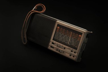 1990s electronic old radio has a white and brown color on isolated background. electronic old radio that was widely used in the 90s. old radio is an aesthetic and vintage object