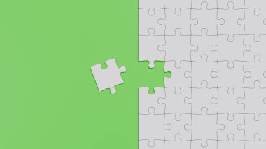 Eksik Parçalı, Dikey Taşınmış Bir Beyaz Yapboz Yeşil Arkaplanda Yatar