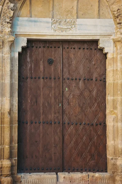 Detail of an inn door and stone walls from the Ottoman medieval period. Ottoman architecture mosque entrance door